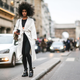 Black model with a Gucci bag during Paris Fashion Week on Jan. 25, 2017 (Edward Berthelot/Getty Images)